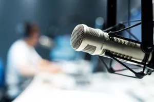 Radio studio with microphone in the foreground
